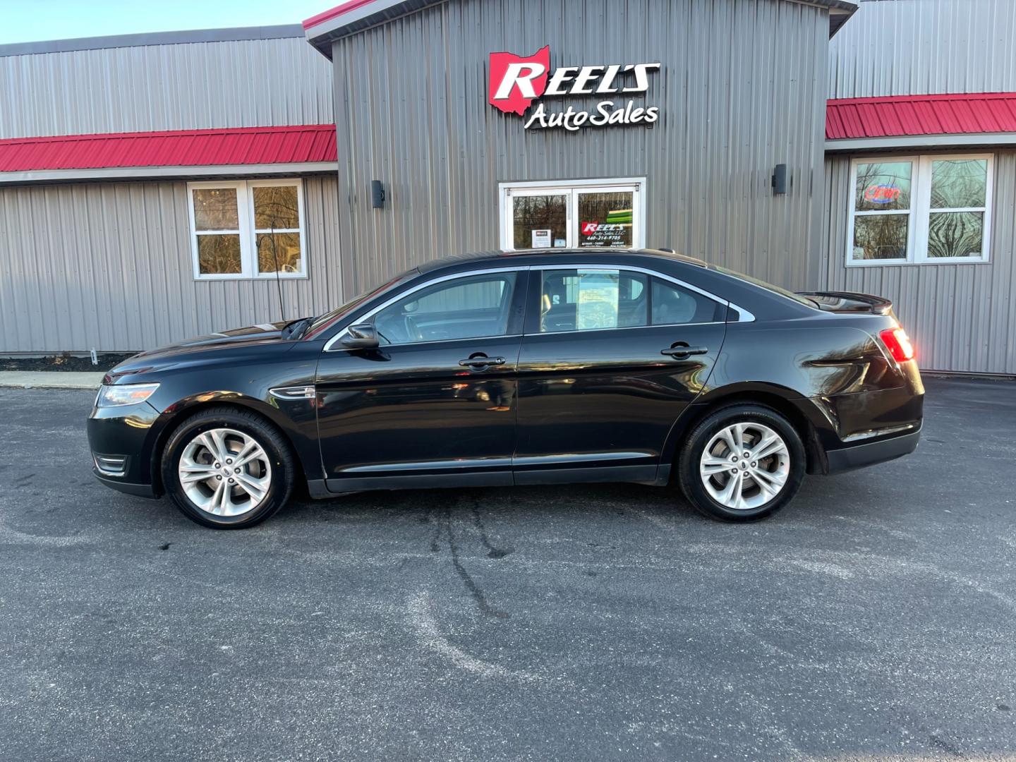 2013 Black /Black Ford Taurus SEL FWD (1FAHP2E85DG) with an 3.5L V6 DOHC 24V engine, 6-Speed Automatic transmission, located at 547 E. Main St., Orwell, OH, 44076, (440) 437-5893, 41.535435, -80.847855 - Photo#14